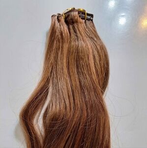Clip-in human hair extensions